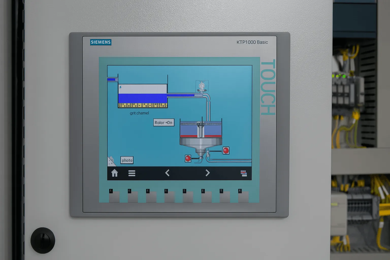 Siemens KTP1000 Basic Panel in operation within an industrial control cabinet